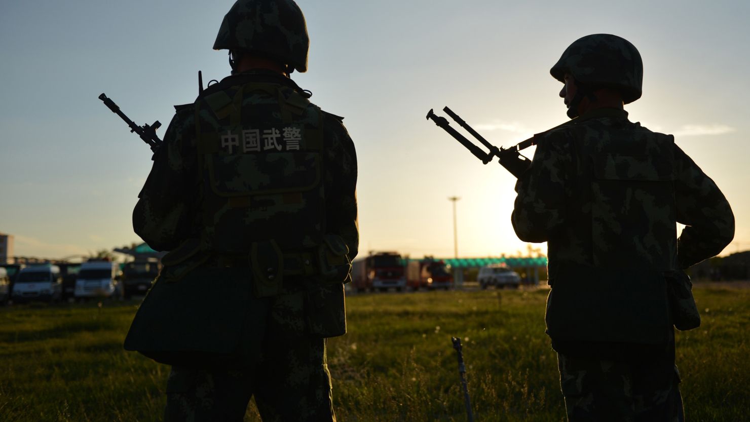 Anti-terrorism forces stand watch in this file image taken in northwest China's Xinjiang region.