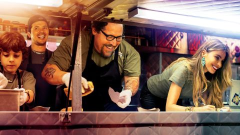 Scene from "Chef" starring Jon Favreau (glasses) and Sofia Vergara (right)