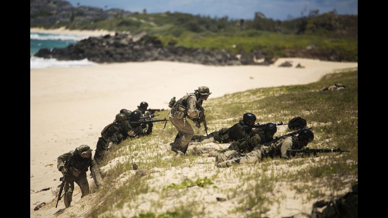 Japanese soldiers participate in an amphibious assault exercise July 1 at Pyramid Rock Beach, Hawaii.