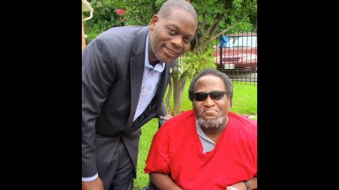 District Attorney Craig Watkins poses with Phillips post-exoneration.