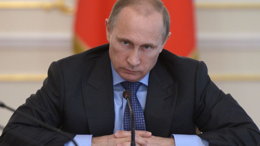 Russian President Vladimir Putin heads the Cabinet meeting in the Novo-Ogaryovo residence, outside Moscow, Russia, Wednesday, July 30, 2014.