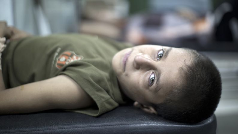 A Palestinian boy waits for treatment at a hospital in Beit Lahia after being wounded during an early morning airstrike <a href="http://www.cnn.com/2014/07/18/world/gallery/israel-gaza/index.html" target="_blank">at a school-turned-shelter</a> in northern Gaza on Wednesday, July 30. The United Nations blamed Israel for the attack after <a href="http://www.cnn.com/2014/07/18/world/gallery/israel-gaza/index.html" target="_blank">Israel launched a ground operation in Gaza</a> on Thursday, July 17, after a 10-day campaign of airstrikes failed to halt relentless Hamas rocket fire on Israeli cities. 