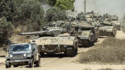 Israeli Merkava tanks roll to the southern Israeli border with the Gaza Strip, on August 1, 2014. Israeli forces in the southern Gaza Strip are searching for a missing soldier they fear may have been captured by militants at the start of a new ceasefire, the army said.