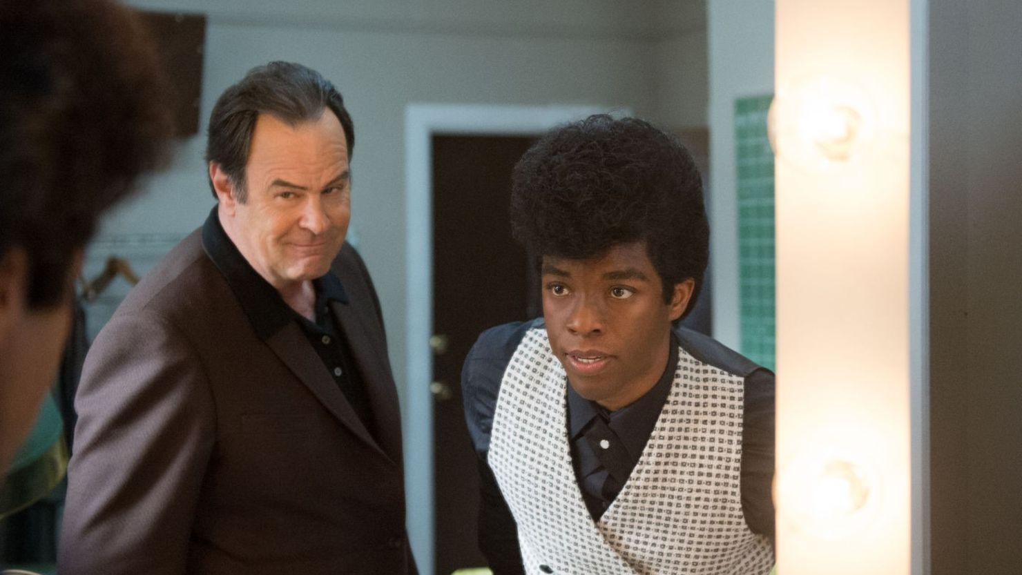 Dan Aykroyd, left, plays Ben Bart in "Get On Up" along with Chadwick Boseman as James Brown.