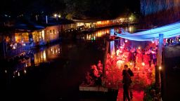 BERLIN, GERMANY - AUGUST 21: Guests spend the night in the beach bar so called club of the visionairs in the early morning hours of August 21, 2011 in Berlin, Germany. Berlin, which is among Europe's most popular travel destinations, is crisscrossed with canals and rivers over which lead a total of 564 bridges. The city's ample access to water has encouraged many bar and restaurant owners to create beach atmosphere as a growing summer day- and nightlife institution. (Photo by Carsten Koall/Getty Images)