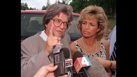 Prejean speaks to the media after Lori Urs, right, married Joseph O'Dell just hours before his execution in Virginia in 1997. Prejean believes O'Dell was innocent, too.