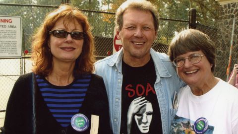 Prejean with actress Susan Sarandon, who won an Oscar for her portrayal of the nun, and Father Roy Bourgeois at protest in Fort Benning.