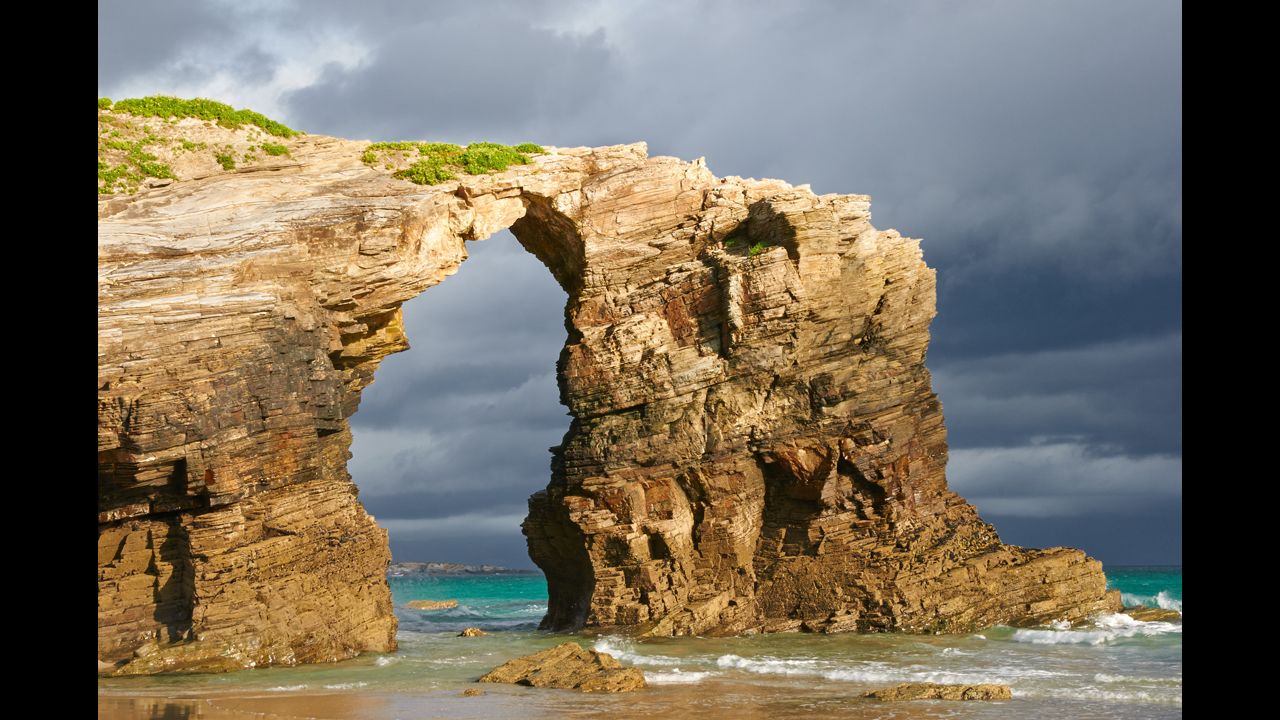 Erosion really is a wonder. On Spain's Galician coastline near Ribadeo, As Catedrais features naturally carved arches that resemble a cathedral. 