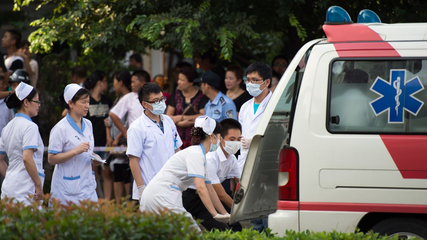 A victim is taken to hospital after a factory explosion in Kunshan on August 2, 2014