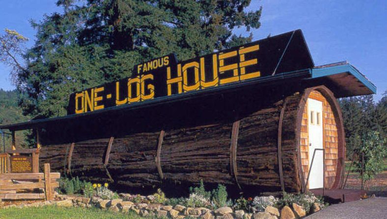 A 32-foot redwood on wheels, the One Log House once served as a mobile home for Art Schmock, traveling to county fairs across the United States, but now serves as a cafe in Garberville, California