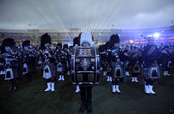 The Royal Edinburgh Military Tattoo performs. As many as 70,000 people attended the ceremony.