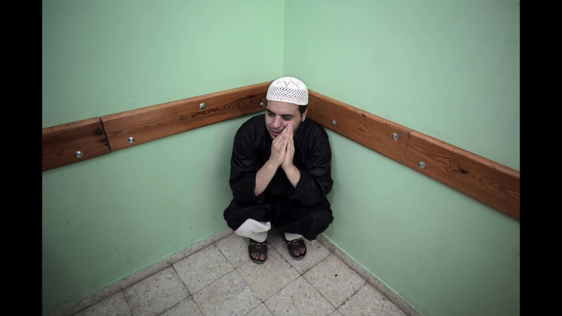 A Palestinian man sits in a hospital in Rafah, Gaza, on August 3.