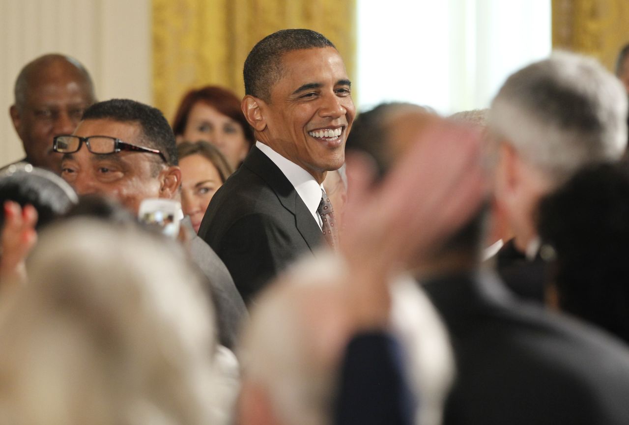 President Barack Obama reacts as the audience sings "Happy Birthday" after he presented the 2010 Citizens Medals at the White House. (AP Photo/Charles Dharapak)