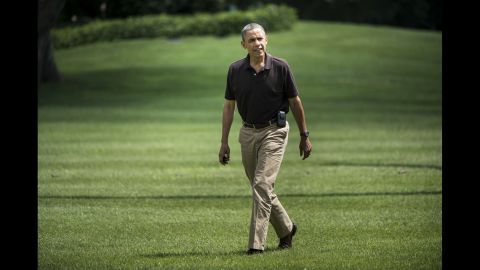 President Barack Obama walking from Marine One upon his return to the White House in August 2012 following a visit to Camp David, Maryland, where he spent his 51st birthday.