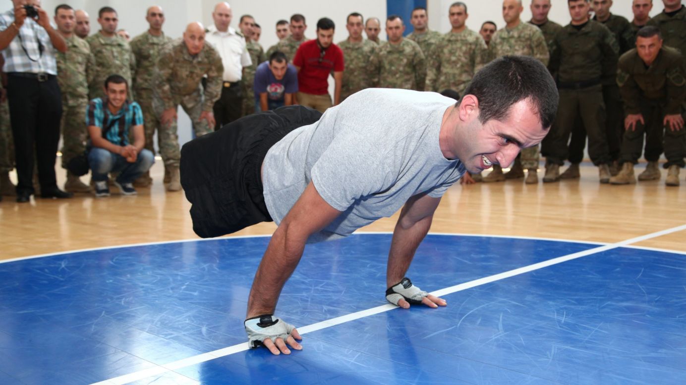 Georgian soldier Temur Dadiani, a double amputee, sets a Guinness World Record by doing 36 planche pushups in 38.25 seconds Sunday, August 3, at the Ministry of Defence in Tbilisi, Georgia. Dadiani lost his legs in 2011 after an explosion in Afghanistan.