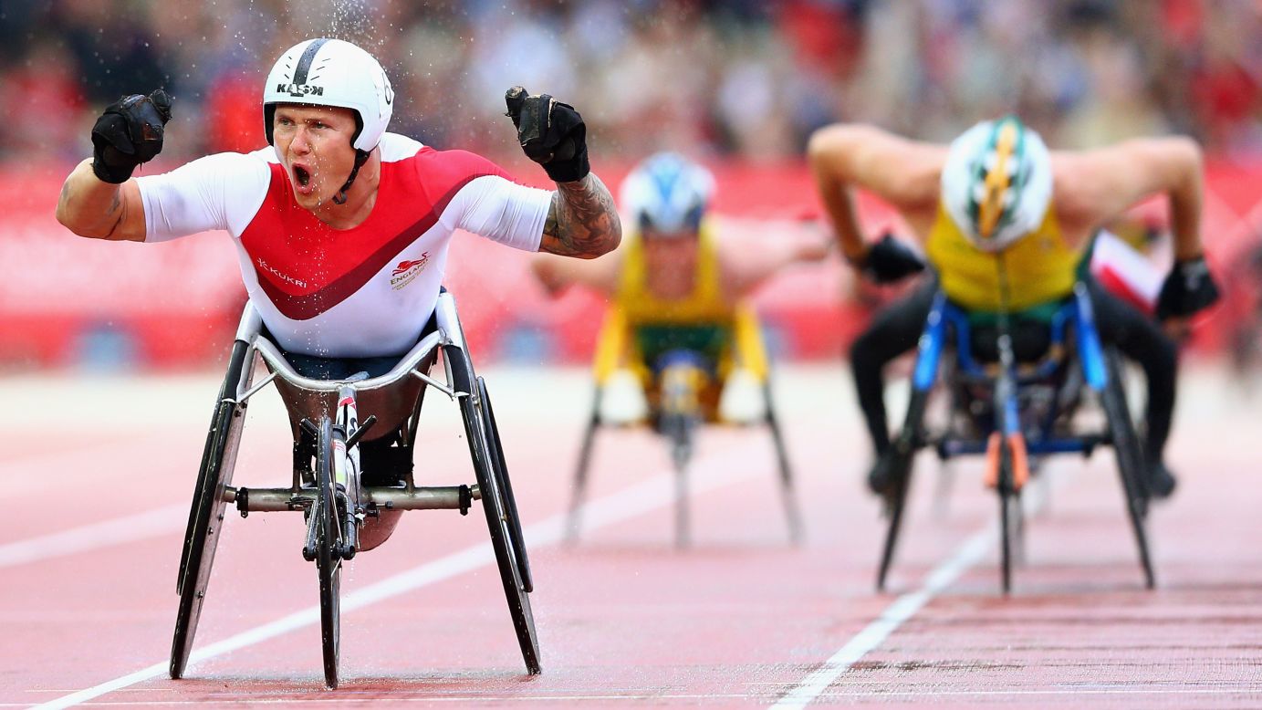 David Weir of England crosses the line to win gold in the T54 1,500-meter final Thursday, July 31, at the Commonwealth Games in Glasgow, Scotland.