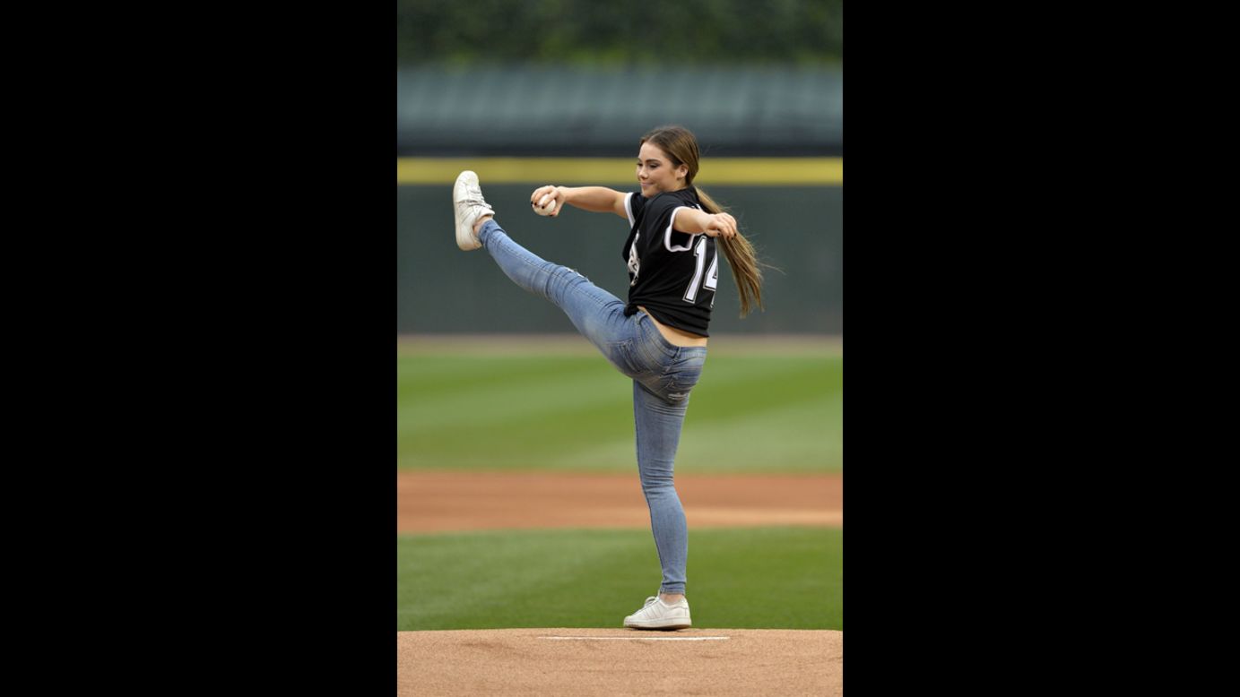 Olympic gymnast McKayla Maroney throws out the ceremonial first pitch before the Chicago White Sox hosted the Minnesota Twins on Friday, August 1. She included some acrobatics in her pitch, which you <a href="https://twitter.com/whitesox/status/495438753209384960/photo/1" target="_blank" target="_blank">can see here in a White Sox tweet.</a>