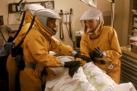 In 1995's "Outbreak," Dustin Hoffman and Rene Russo work to contain Motaba, a fictional disease similar to Ebola. The outbreak spreads from Africa to the United States via an infected monkey before a serum is created.