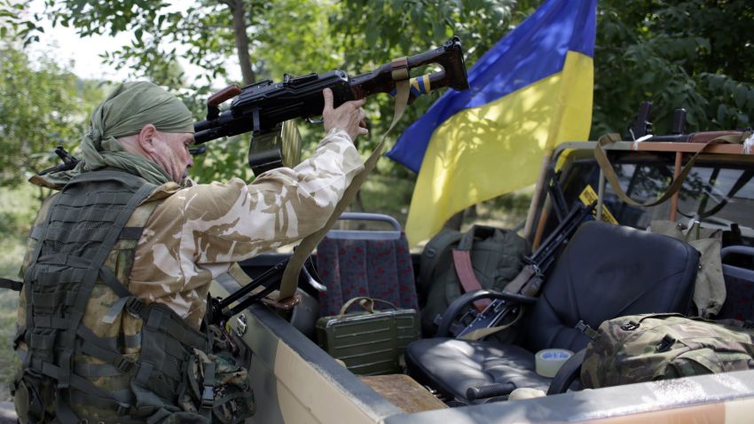 Ukrainian servicemen from the Donbass volunteer battalion on August 4, 2014 prepare for redeployment from Popasna, Lugansk region, freed by Ukrainian forces from the pro-Russian militants, to Donetsk. The deputy mayor in the encircled insurgent stronghold of Donetsk told AFP that shooting in a residential suburb had killed six civilians and injured 13, the latest victims of more than three months of civil war that has claimed at least 1,150 lives. AFP PHOTO/ ANATOLII STEPANOVANATOLII STEPANOV/AFP/Getty Images