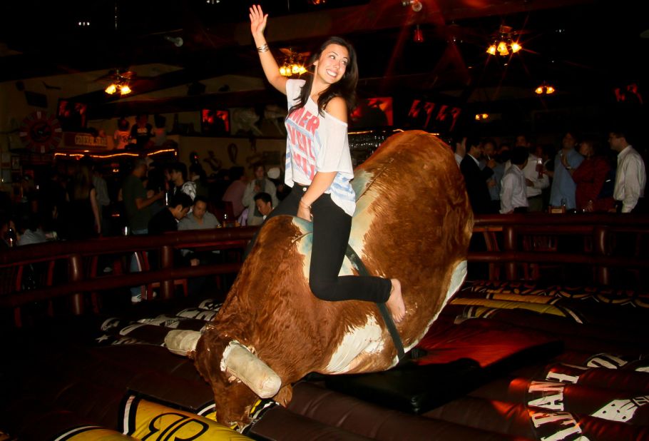 A big ol' wooden lair done up with hay bales and mannequins in racy Western regalia, The Saddle Ranch Chop House is a steak and taters place with a mechanical bull.