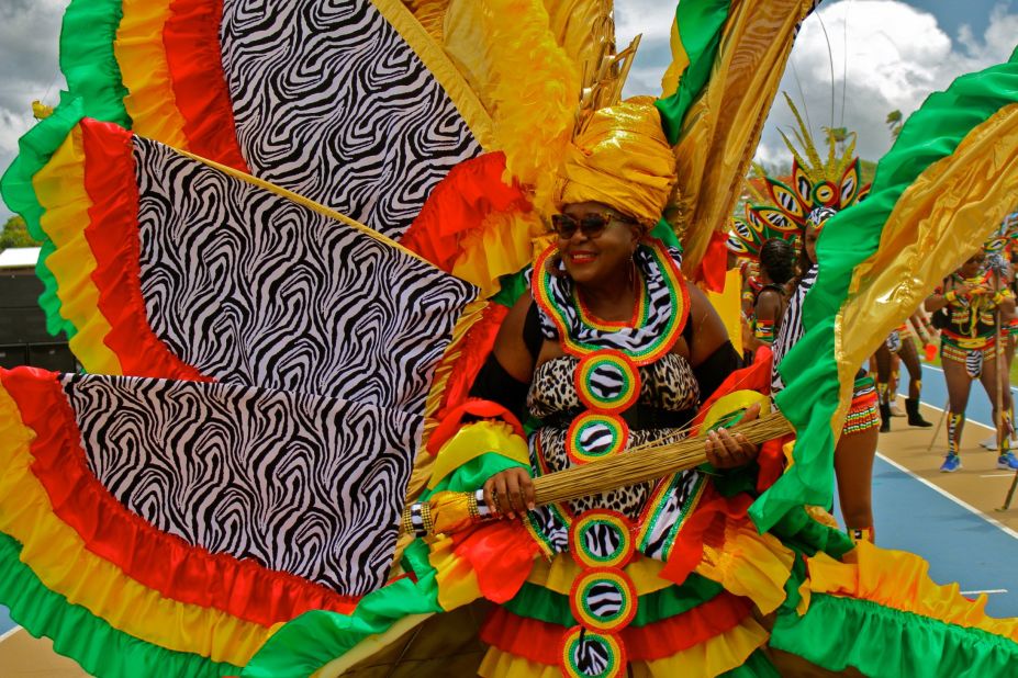 Participating in a Grand Kadooment band means you've chosen a group to parade with and purchased a team costume. Individual costumes tend to be larger and more greatly adorned.