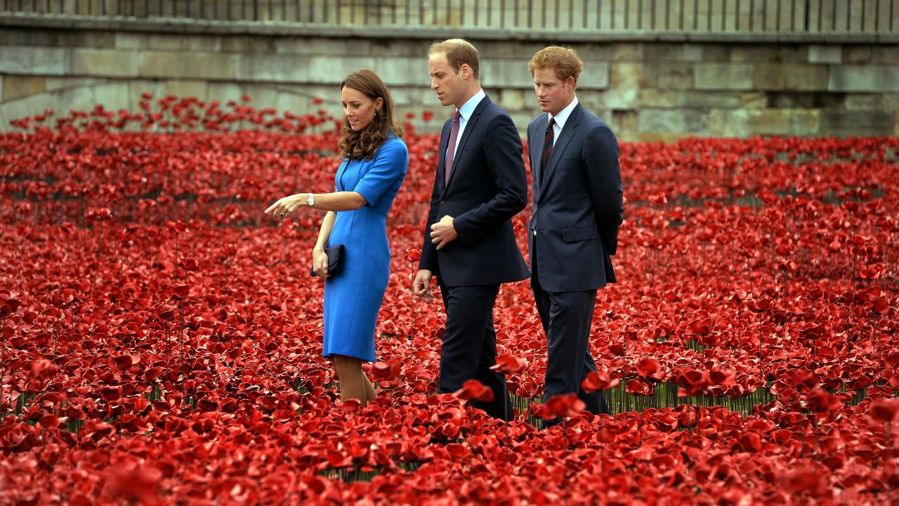 From right, Britain's Prince Harry, Prince William and Catherine, Duchess of Cambridge, visit the Tower of London's ceramic poppy installation Tuesday, August 5. Thousands of ceramic poppy flowers have been installed in the dry moat surrounding the tower to mark the 100th anniversary of World War I. There will be 888,246 ceramic poppies installed, one for each British military member that died during the war.