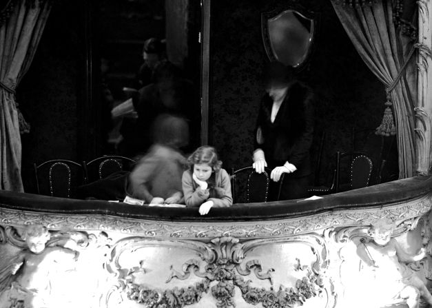 Princess Elizabeth is seen in the Duchess' box during a pantomime act at London's Lyceum Theater in February 1935.