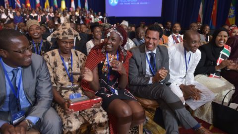 A woman laughs at a meeting of young African leaders talking with President Obama before the U.S.-Africa Summit convened. 