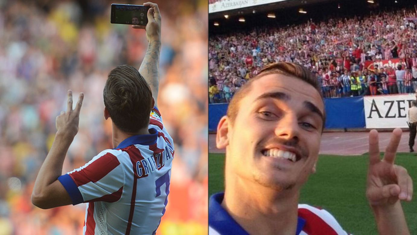 Soccer player Antoine Griezmann <a href="https://twitter.com/AntoGriezmann/status/494948540427542528/photo/1" target="_blank" target="_blank">takes a selfie</a> as he is presented to fans of his new club, Atletico Madrid, at the Vicente Calderon Stadium in Madrid on Thursday, July 31. 
