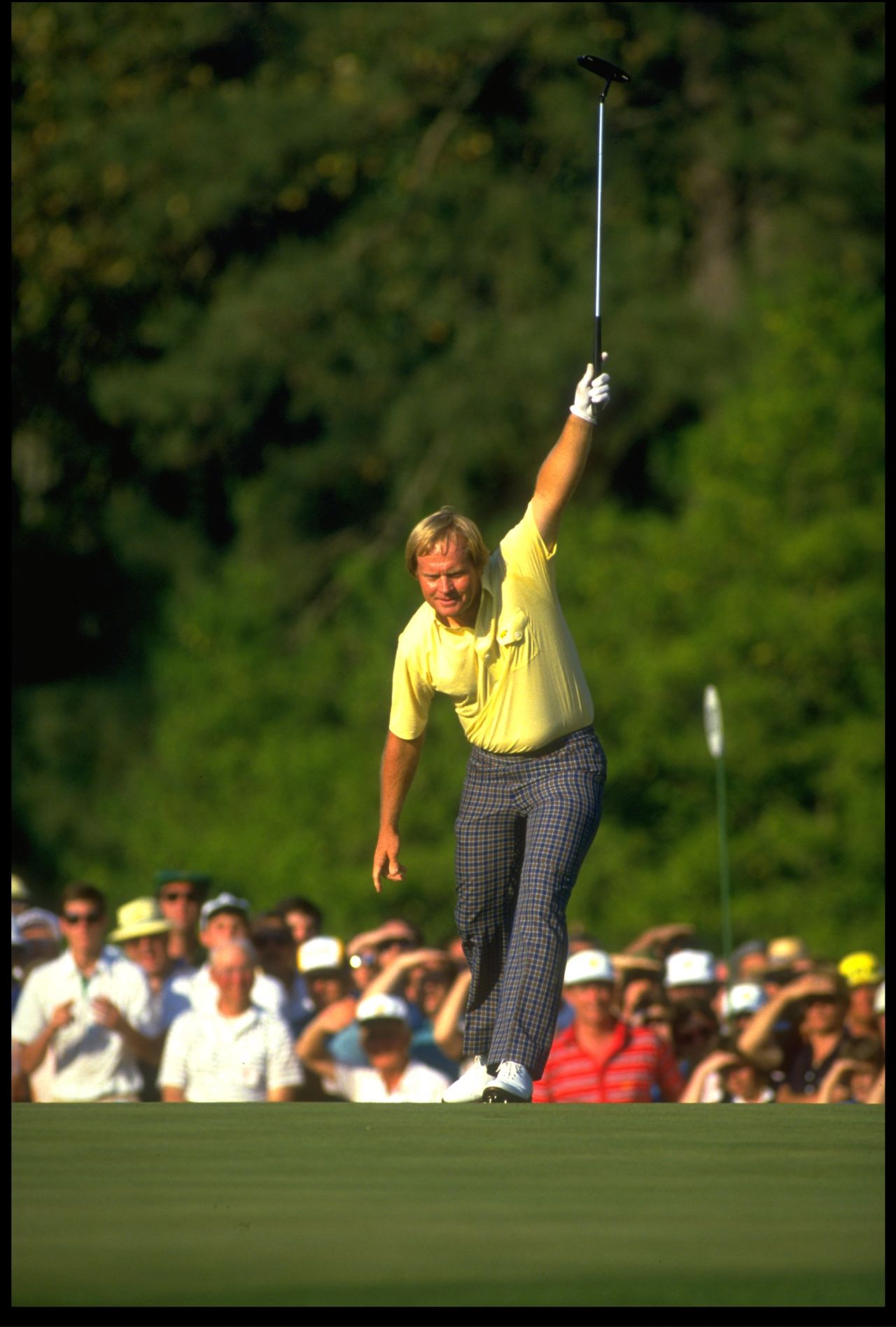 One of the most famous images in golf: Nicklaus rolls in a birdie putt during his victory charge at the Masters in 1986, when -- age 46 -- he became the major event's oldest winner.  