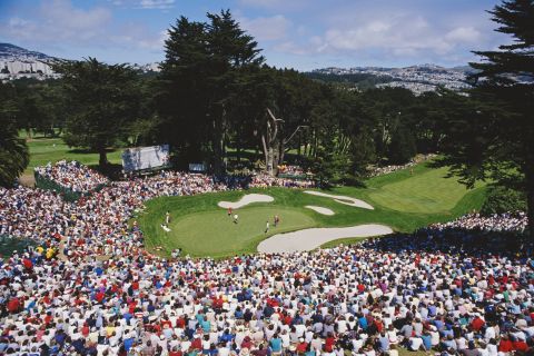 This photo captures the spectacular natural amphitheater that surrounds the final green at The Olympic Club in San Francisco.<br /><br />The historic course is now almost a century old and was host of the 1987 U.S. Open -- where this image was taken.<br /><br />"The U.S. PGA only had to construct one small stand as everywhere else spectators were sitting on the natural slopes," Cannon said.