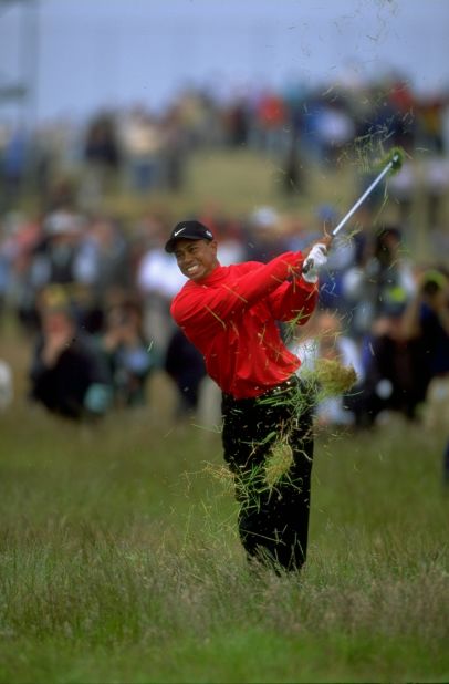 A grimacing Tiger Woods summons all of his strength to battle his way out of the deep rough on a weather-battered Carnoustie course at the 1999 British Open.<br /><br />"Tiger has been enormously influential for all of us working in golf. It is impossible to evaluate his contribution to the game," said Cannon.<br /><br />"For me, apart from Seve and Greg Norman, he is my ultimate 'subject.' Every single day I go out to follow him, like Seve and Greg, he makes a picture wherever or whatever he is doing on the course at the time. <br /><br />"This moment summed up the week at Carnoustie where the rough was the fiercest I have ever seen, and Tiger found plenty of it."