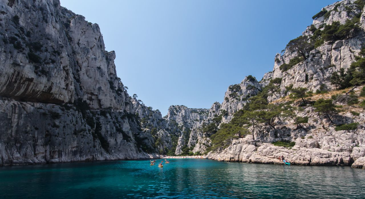 Calanque d'En Vau, along the Mediterranean coast of France between Cassis and Marseille, is one of a series of steep, narrow coves and inlets cutting into the shore. The beach can be reached on foot or by boat.