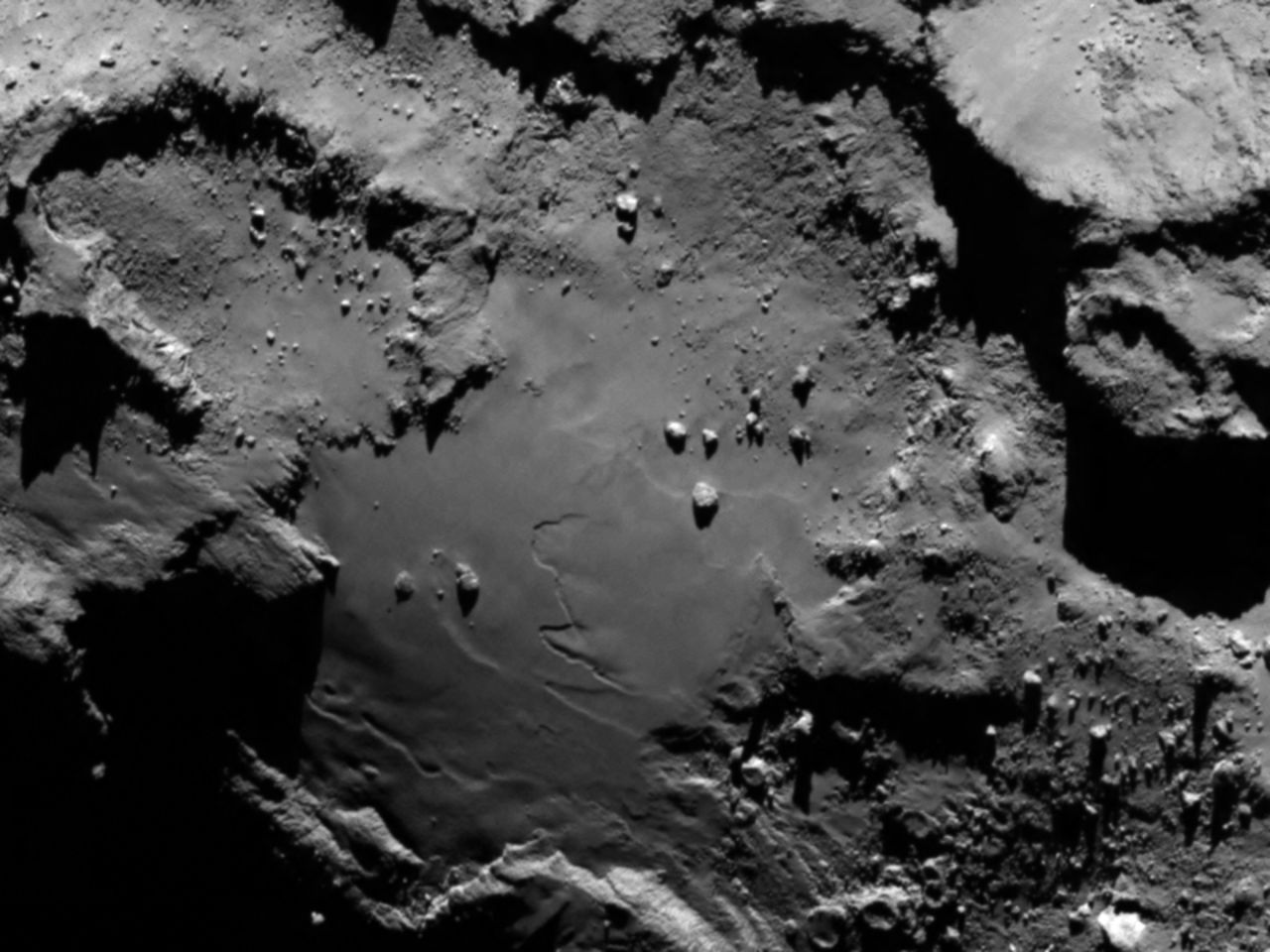 Scientists hope the lander will provide data from surface operations for at least a week, and continue for months as the comet travels toward the Sun. This incredible close up of the comet surface was taken from the Rosetta orbiter upon approach, from a distance of 130km, in early August. The image shows a range of features including boulders, craters and steep cliffs.