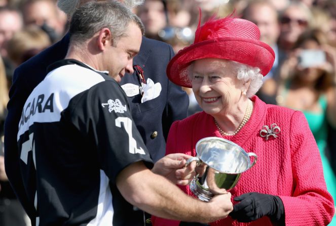 Queen Elizabeth II always presents the prizes at the Cartier Queen's Cup at Guards Polo Club near Windsor. The British Royal family are great supporters of equestrian events. 