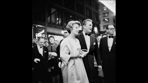 A number of Maier's photographs feature some of the most celebrated personalities of her era, such as Audrey Hepburn, Frank Sinatra, and in this picture, Kirk Douglas.<br /> <br />"She was a film buff, she knew a lot about foreign films and where all the premieres were taking place," says John Maloof. "She would also go to book signings and take photos of the authors."