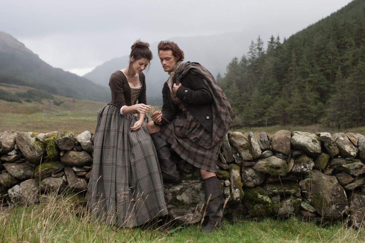 Claire Randall (Caitriona Balfe) and Jamie Fraser (Sam Heughan), on Starz show "Outlander". A British-American TV drama series based on Diana Gabaldon's "Outlander" novel series, the story follows WWII combat nurse Claire Randall who travels back in time to 1743 where she encounters Scottish warrior Jamie Fraser.