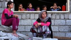 Iraqi Yazidi women, who fled the violence in Sinjar, Iraq, take shelter at a school in Dohuk, Iraq, on August 5.