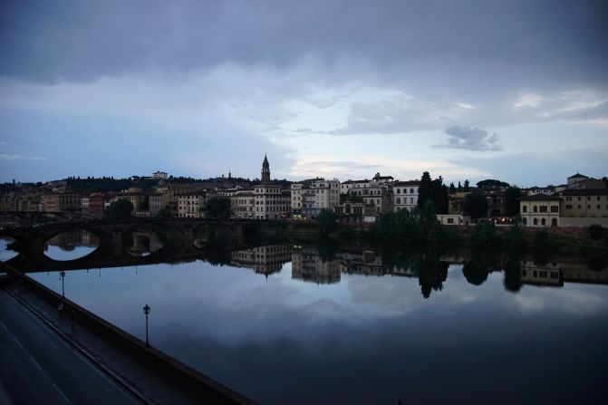 Michelle McLemore fell in love with how serene the <a href="index.php?page=&url=http%3A%2F%2Fireport.cnn.com%2Fdocs%2FDOC-1149877">Arno River</a> looked from her Florence, Italy, hotel balcony. But the river hasn't always been so calm and peaceful. Its floodwaters devastated Florence in 1966, damaging priceless works of art, books and monuments throughout the city -- not to mention killing 39 people and leaving thousands homeless. 