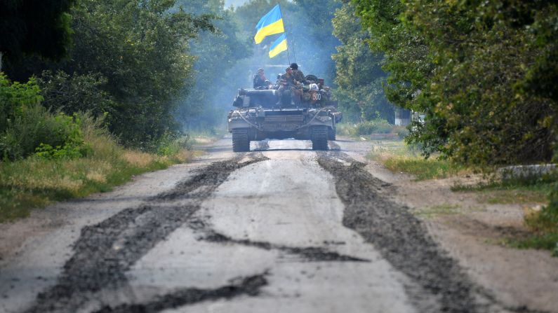 Ukrainian troops patrol near the village of Novoselovka on Thursday, July 31.