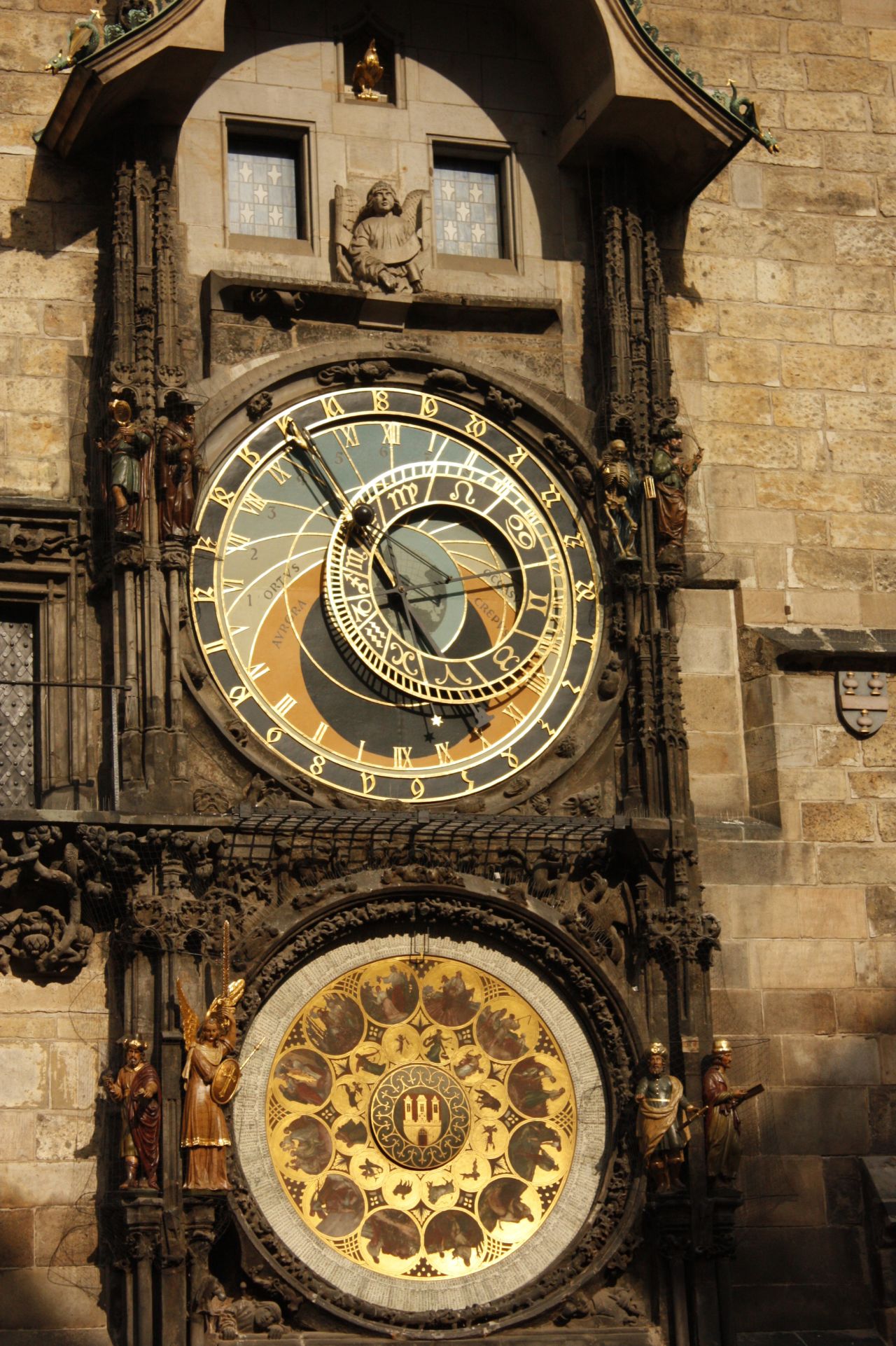 <strong>Old Town Astronomical Clock, Prague, Czech Republic</strong><br /><strong>Completed: </strong>1410<br /><strong>Height: </strong>59 meters (193 feet)<br /><strong>Builders: </strong>Co-built by clockmaker Mikulas of Kadane and Jan Sindel, a mathematics and astrology professor at Charles University in Prague.<br /><strong>Observation deck</strong><br />For $5, visitor can tour the tower and access the observation deck, which sits above the clock.<br /><strong>Special features</strong><br />Each hour from 9 a.m. to 9 p.m., models of the Twelve Apostles are set in motion. Each has a distinctive feature -- St. Peter for example is holding a key (to the Kingdom of Heaven). Other figures standing next to the dial include a Grim Reaper and a man looking into a mirror, representing mankind's vanity.<br /><em>More on Prague's Old Town Astronomical Clock the next slide.</em>
