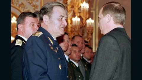 Vladimir Putin presents an award to Air Force Gen. Anatoly Kornukov in February, 2000.