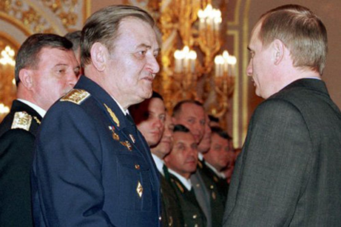Vladimir Putin presents an award  to Air Force Gen. Anatoly Kornukov in February, 2000.