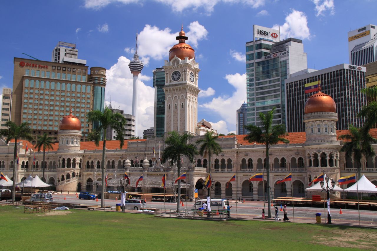 <strong>Sultan Abdul Samad Building's Clock Tower, Kuala Lumpur, Malaysia</strong><br /><strong>Completed: </strong>1897<br /><strong>Height: </strong>40 meters (131 feet)<br /><strong>Architect: </strong>A.C. Norman<br /><strong>Special feature</strong><br />Topped with a golden dome, the building is a blend of Moorish and British design.<br /><em>More on the next slide.</em>
