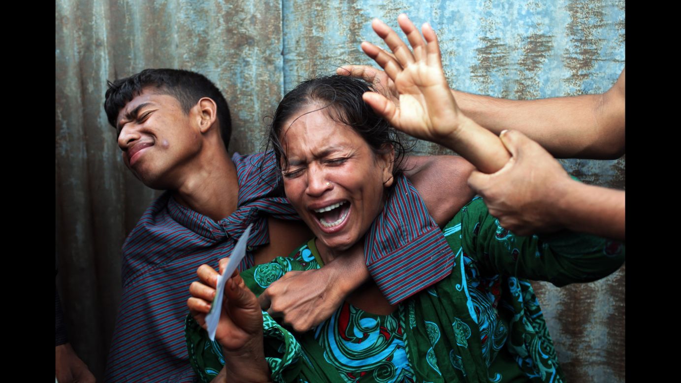 A woman named Munni cries after a passenger ferry with as many as 300 people on board <a href="http://www.cnn.com/2014/08/06/world/asia/bangladesh-ferry-rescue-hampered/index.html">capsized in Bangladesh's Munshiganj district</a> on Monday, August 4. Hundreds of anxious people waited on the bank of the Padma river until late evening as a search for bodies failed to turn up any sign of survivors.