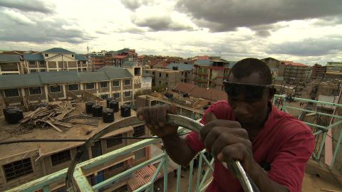 Founder Martin Ojwang has set up his workshop where he lives: on the 5th-floor balcony of an apartment block.