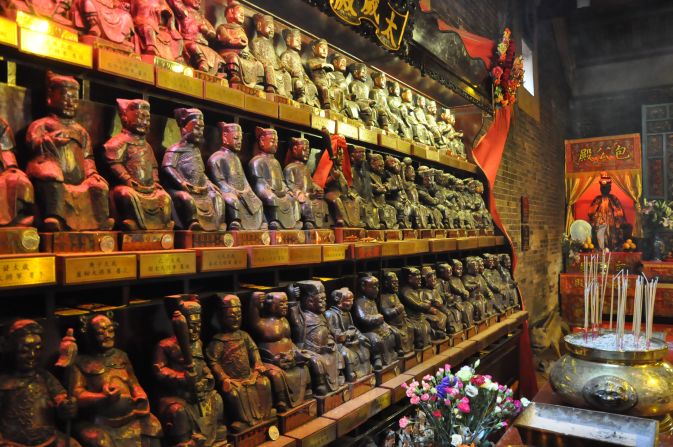 Small statues line the walls at Pak Tai Temple.
