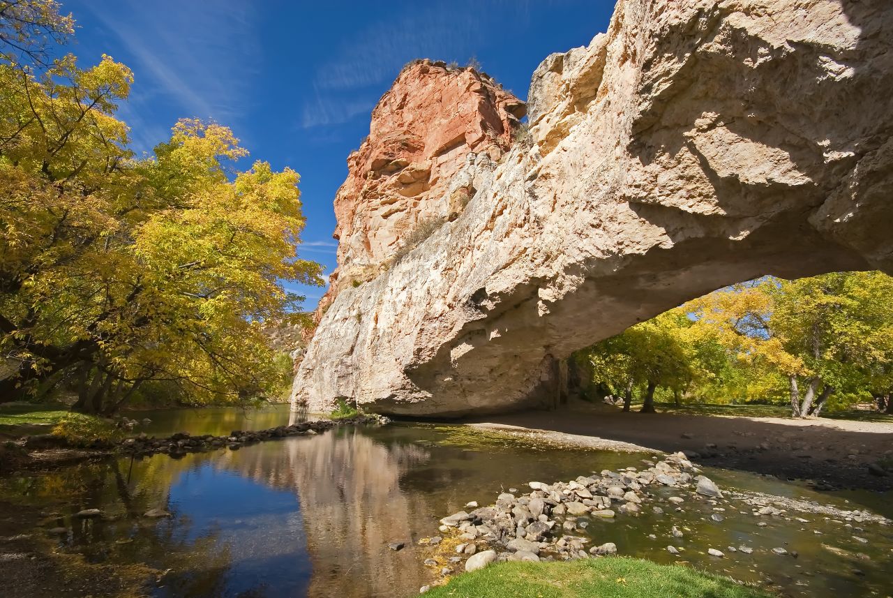 Less famous than its bigger national park cousins (Yellowstone and Grand Teton), Wyoming's Ayres Natural Bridge State Park offers a respite for visitors in the know.