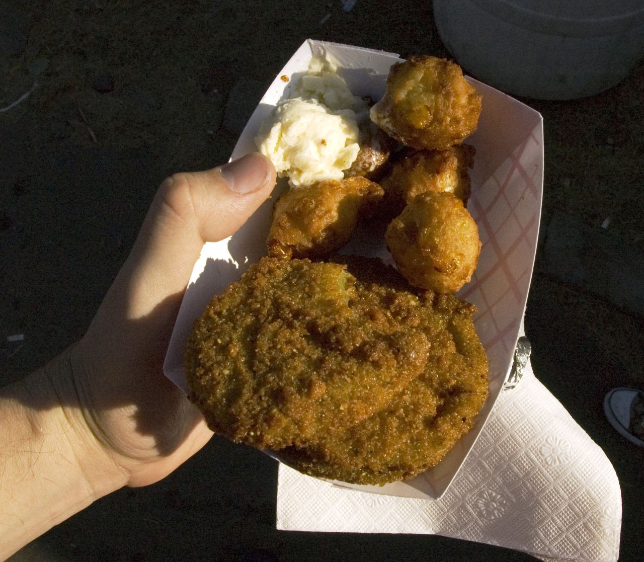 Fried green tomatoes and corn fritters were served hot and fresh with a scoop of honey butter.