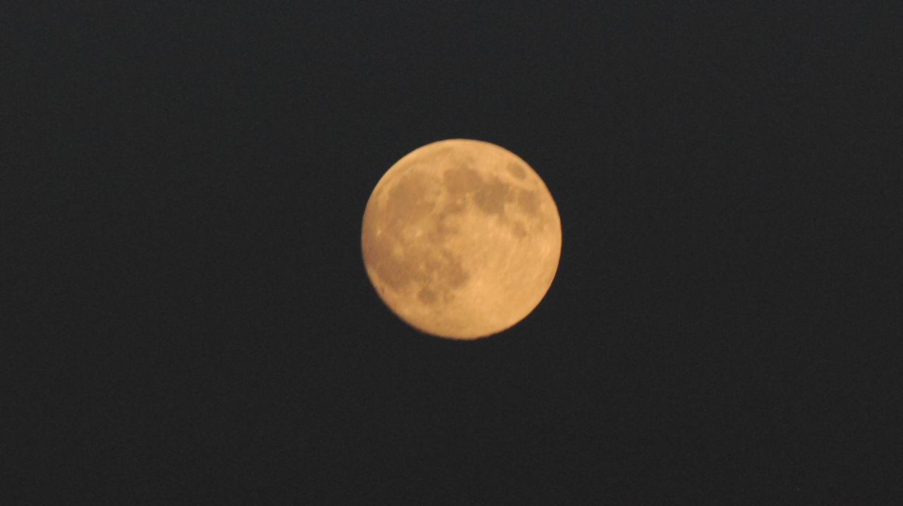 James V. Wardhaugh has been a photographer for 40 years and found that the moon on Saturday night in Belleville, Ontario "was begging to be photographed as cloudy weather kept the last supermoon in July elusive."